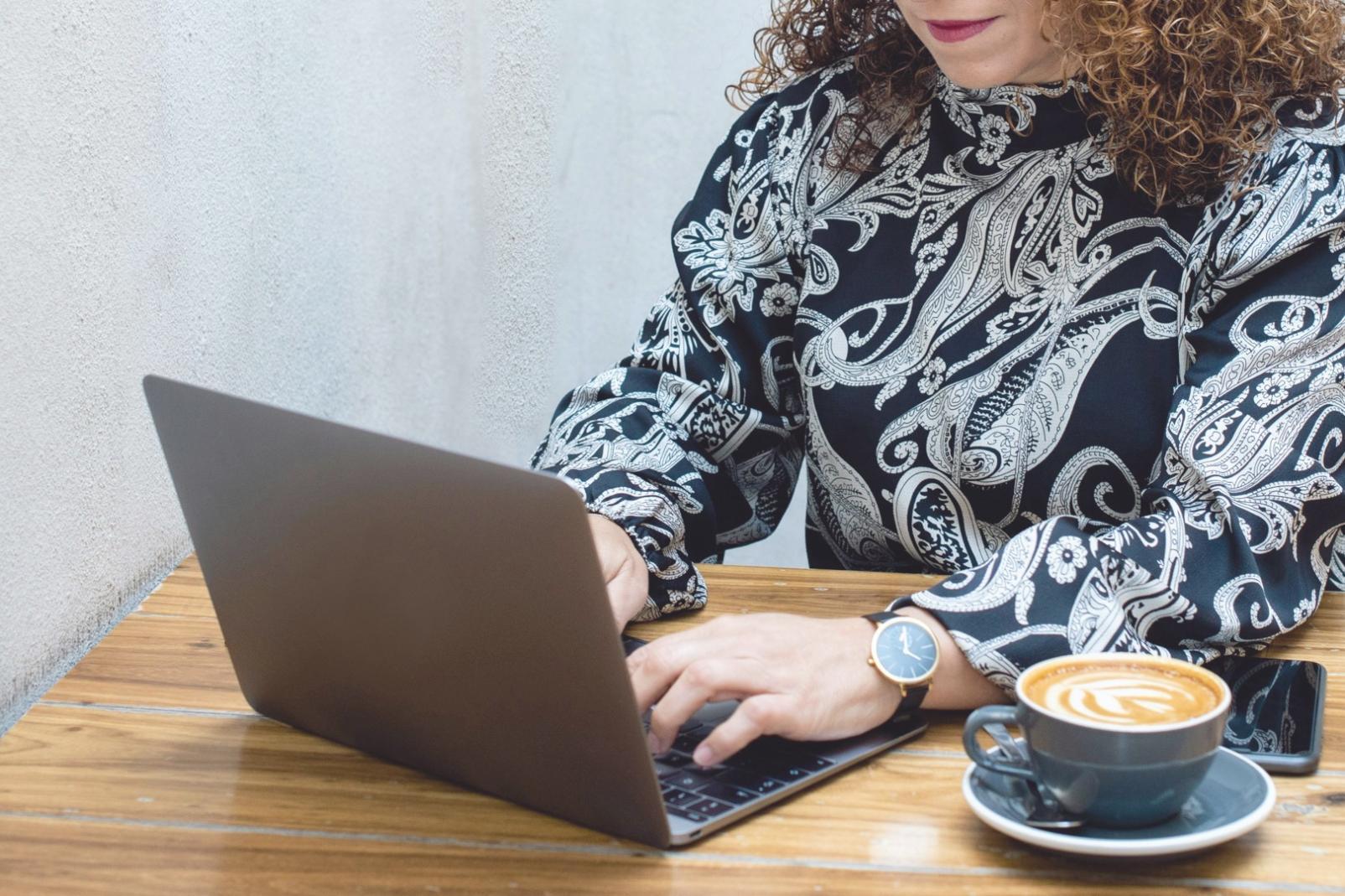 Financial analysis workspace with calculator and business documents